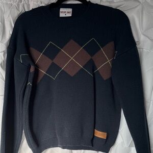 Taylor Swift Crewneck Sweater - Black and Brown Argyle, size medium.